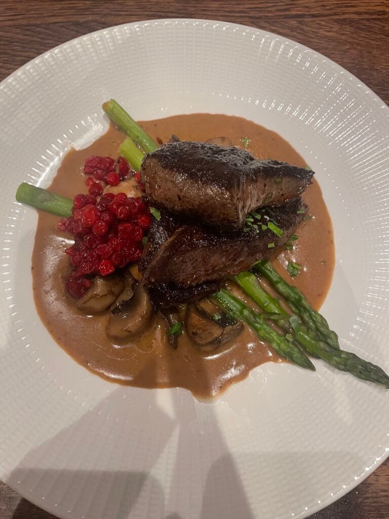 Reindeer steak with lingonberry sauce and asparagus